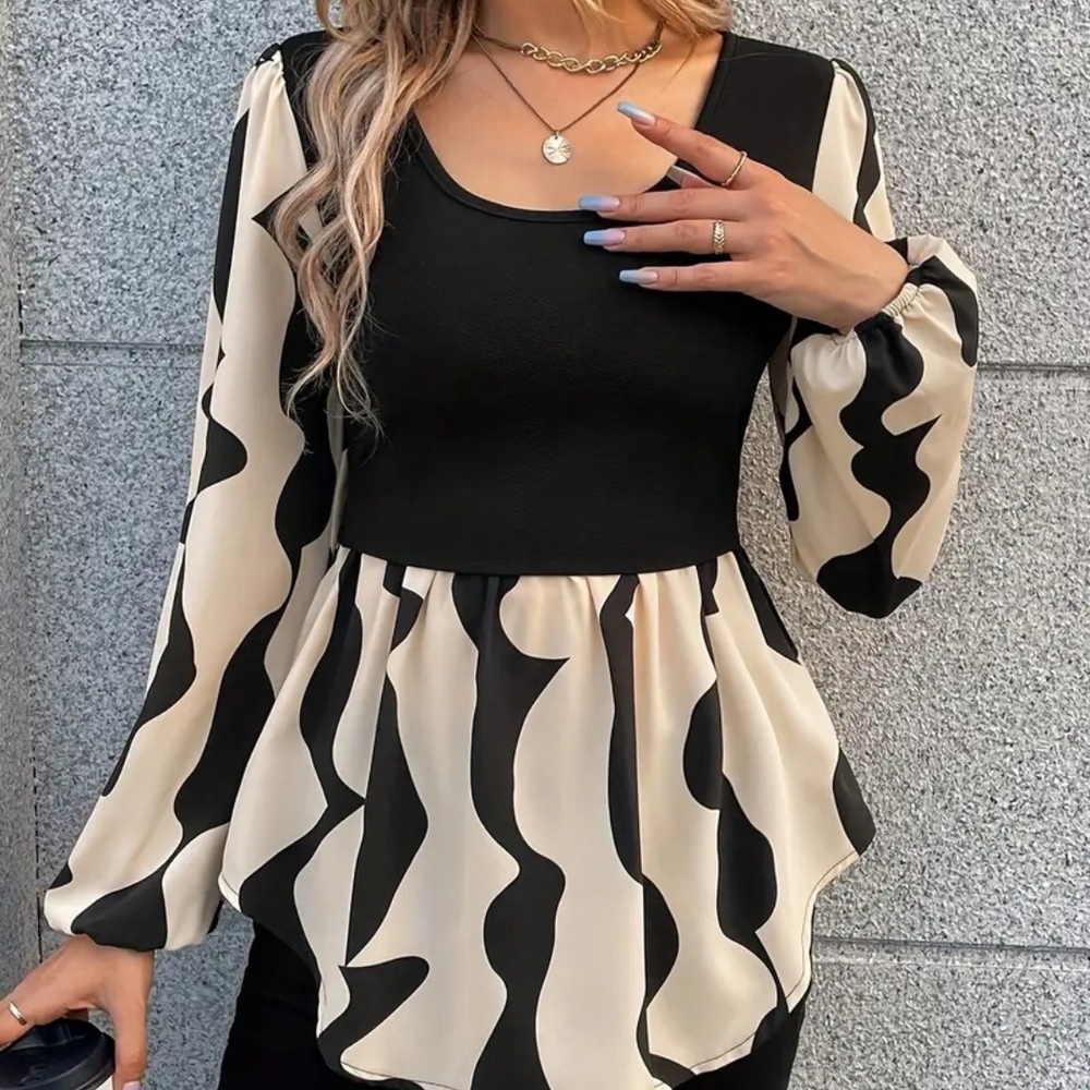 Elegant Black and Cream Blouse
